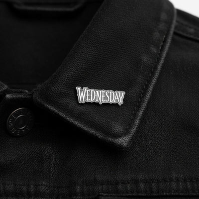 Wednesday shaped pin lifestyle jacket collar close-up