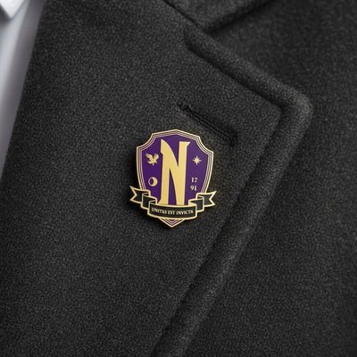 Wednesday Nevermore Academy pin lifestyle small on lapel
