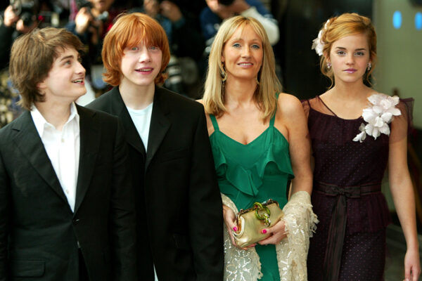 Daniel Radcliffe, left, who plays Harry Potter, Rupert Grint, second left, who plays Ron Weasley, and Emma Watson, right, who plays Hermione Granger, attend the UK premiere of "Harry Potter and the Prisoner of Azkaban", with author J K Rowling, in London, Sunday May 30, 2004. (AP Photo/John D McHugh)